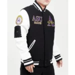 Model in Alcorn black and white varsity jacket, front view