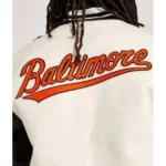 Model in Baltimore Orioles Varsity Jacket, front view