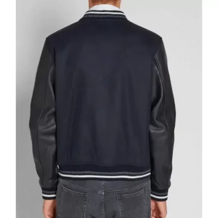 Model wearing Blouson varsity blue and black jacket back view