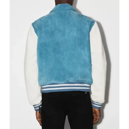 Model wearing Bones Amiri Corduroy Blue Varsity Jacket back view