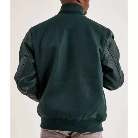 Model wearing Boston Celtics Dark Green Varsity Jacket back view