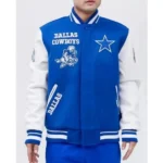 Model wearing Dallas Cowboys Mash Up Varsity Jacket front view