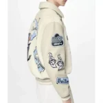 Model in LV Bunny cream varsity jacket, front view