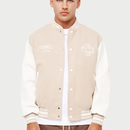 cream and white varsity jacket