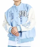 light blue and white varsity jacket