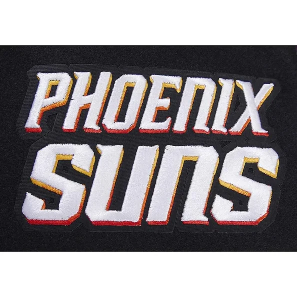 Close-up of Phoenix Suns 2023/24 City Varsity Jacket logo details.