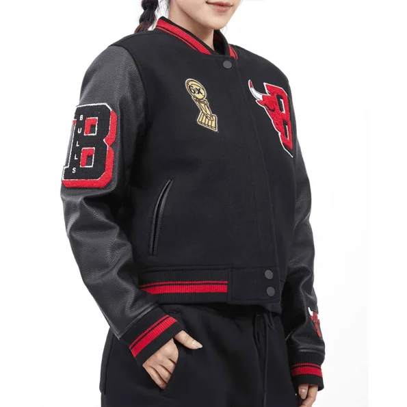 Model wearing Chicago Bulls Mashup 6X Varsity Jacket side view.