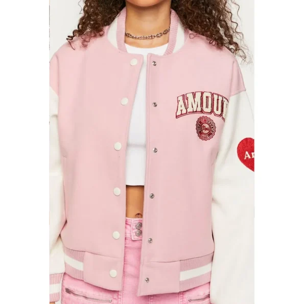 Close-up of "Amour Paris" logo on varsity jacket.