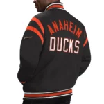 Model front view wearing Anaheim Ducks Tailback Varsity Jacket.