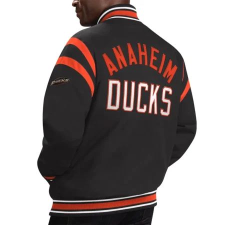 Model wearing Anaheim Ducks Tailback Varsity Jacket back view.