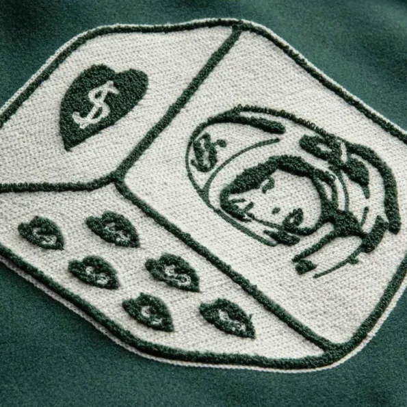 Close-up of Billionaire Girls Club Varsity Jacket details