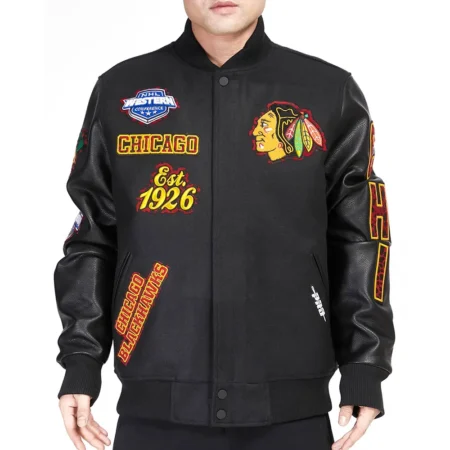 Model wearing Chicago Blackhawks Patches Varsity Jacket front view.