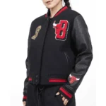 Model wearing Chicago Bulls Mashup 6X Varsity Jacket front view.