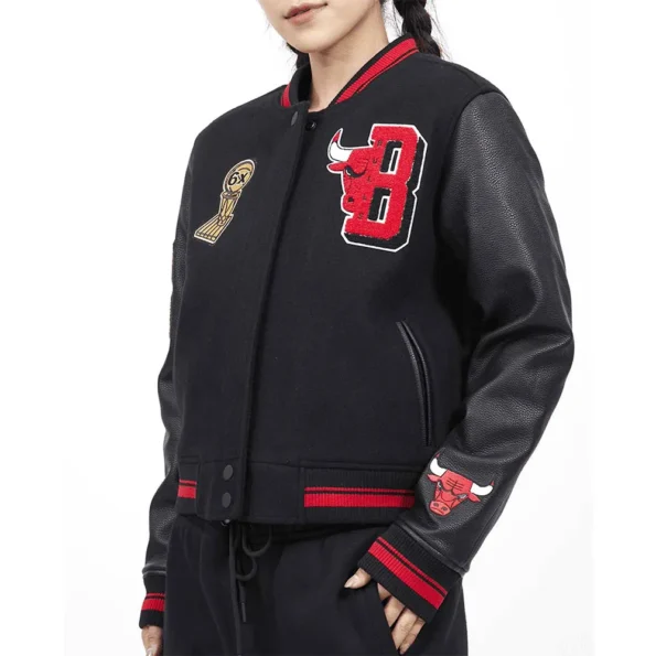 Model wearing Chicago Bulls Mashup 6X Varsity Jacket side view.