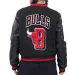 Model wearing Chicago Bulls Mashup 6X Varsity Jacket front view.