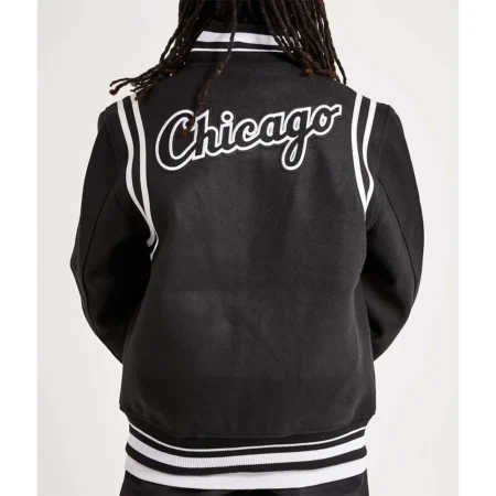 Model wearing Chicago White Sox Comiskey Varsity Jacket back view.