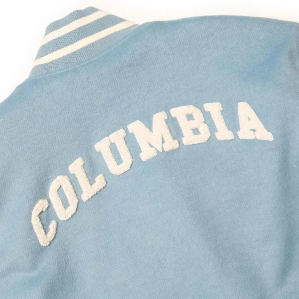 Close-up detail of Columbia University Blue Varsity Jacket logo