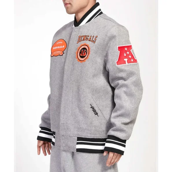 Model wearing Cincinnati Bengals Crest Varsity Jacket side view.