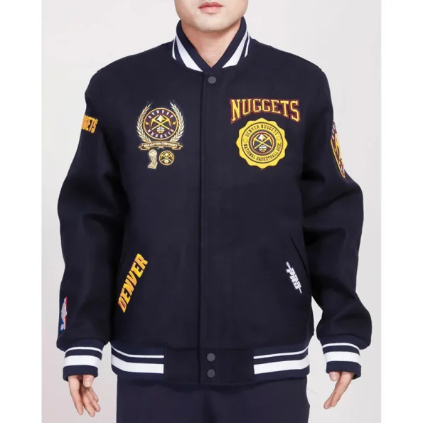 Model wearing Denver Nuggets Crest Varsity Jacket front view.