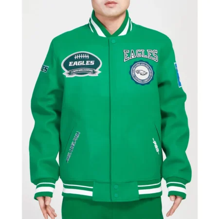 Model wearing Philadelphia Eagles Crest Varsity Jacket front view.