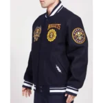 Model front view wearing Denver Nuggets Crest Varsity Jacket.