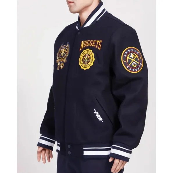 Side profile of model wearing Denver Nuggets Crest Varsity Jacket.