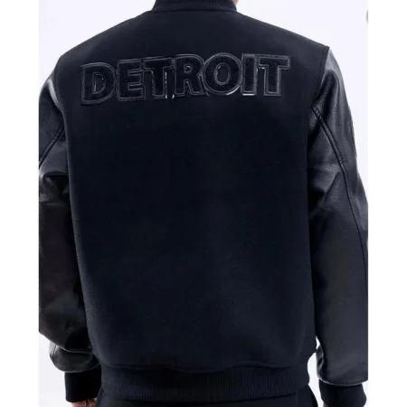 Model wearing Detroit Lions Letterman Varsity Jacket back.