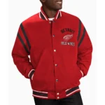 Model wearing Detroit Red Wings Tailback Varsity Jacket front view.