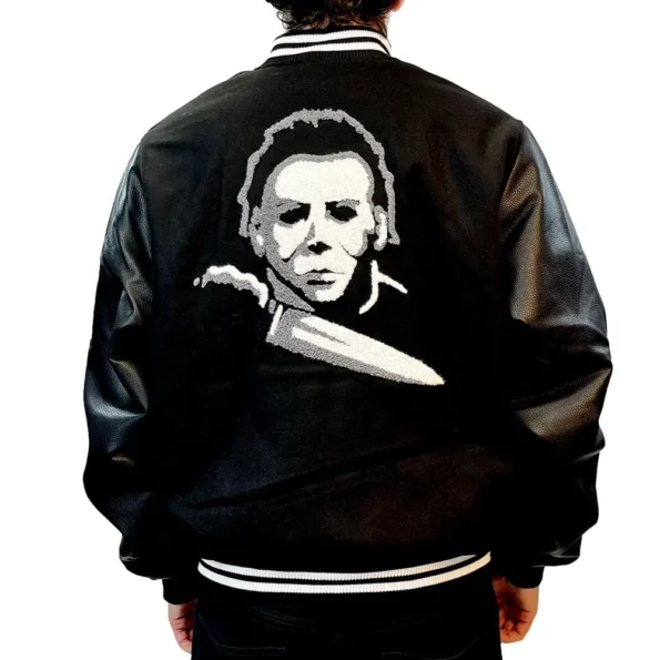 Model showcasing Halloween Michael Myers Varsity Jacket back.