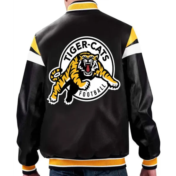 Model wearing Hamilton Tiger-Cats Black Varsity Jacket back view.