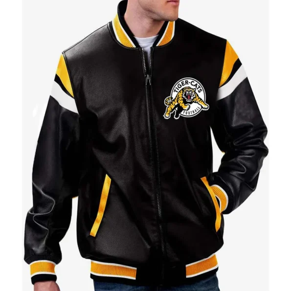 Model wearing Hamilton Tiger-Cats Black Varsity Jacket front view.