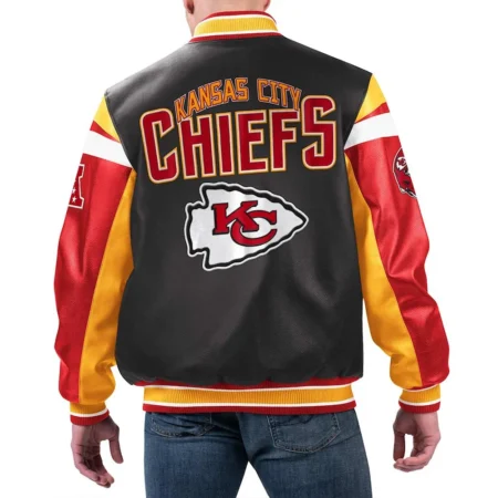 Model wearing Kansas City Chiefs Black Varsity Jacket back view.