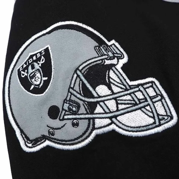 Close-up of Las Vegas Raiders Tailback Varsity Jacket details.