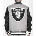 Model front view wearing Las Vegas Raiders Varsity Jacket.