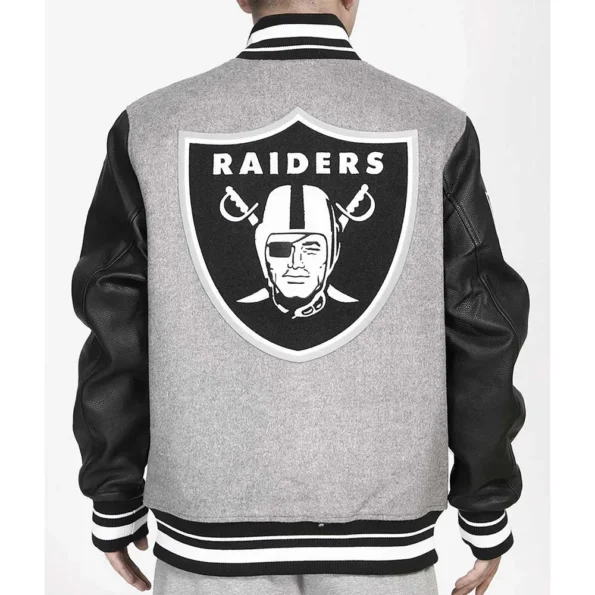 Model wearing Las Vegas Raiders Varsity Jacket back view.