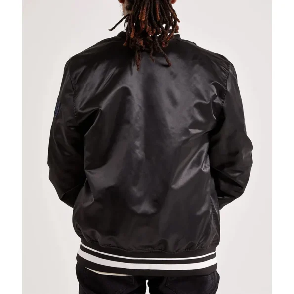 Model wearing Memphis Grizzlies 2001 Varsity Jacket back view.