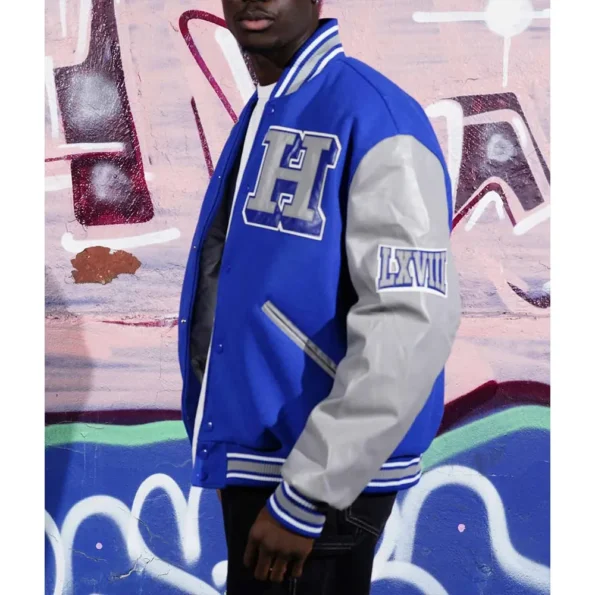 Model wearing Mens Hampton University Varsity Jacket side view.