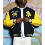 Model in North Carolina AT State Varsity Jacket front.