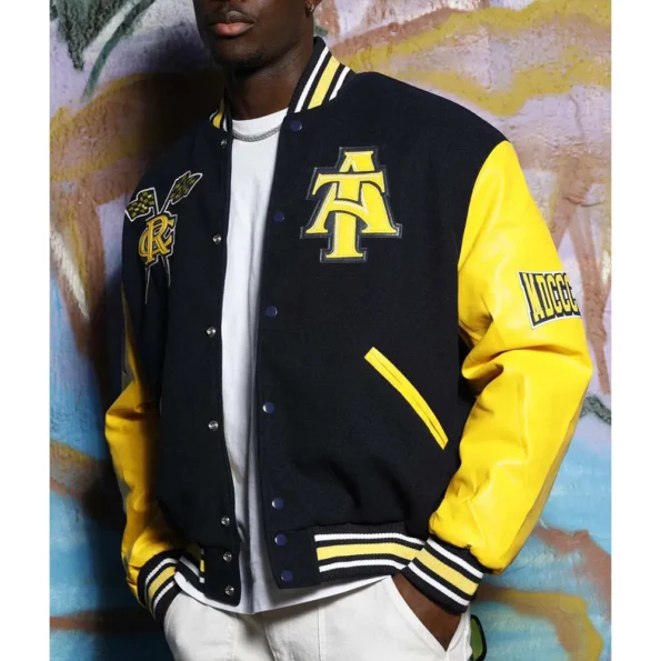 Model wearing North Carolina AT State Varsity Jacket side view.