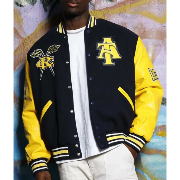 Model wearing North Carolina AT State Varsity Jacket front view.