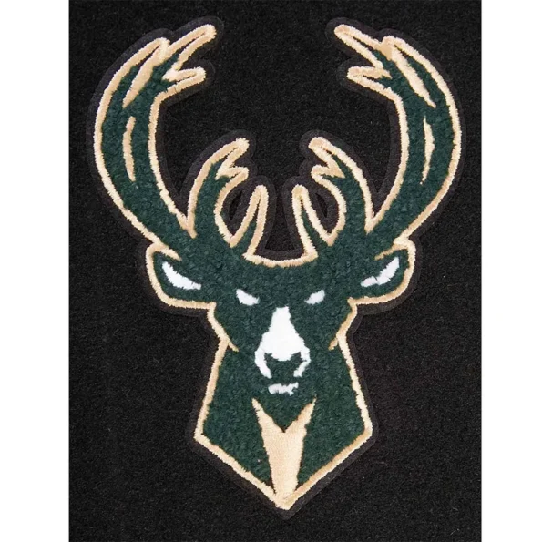 Close-up of Milwaukee Bucks varsity jacket fabric and embroidery.