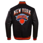 Front view of NY Knicks Chest Layered Varsity Jacket.