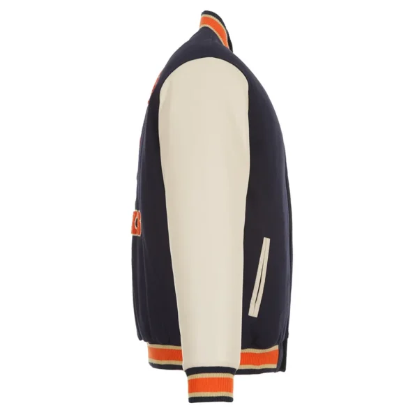 Side view of NY Knicks Chenille Varsity Jacket, blue-orange sleeves.