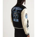 Model front view wearing Off-White Appliquéd Felt Varsity Jacket.