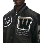 Model front view wearing Full Black Leather Varsity Jacket.