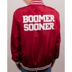 Model showcasing front view of Oklahoma Boomer Sooners varsity jacket.