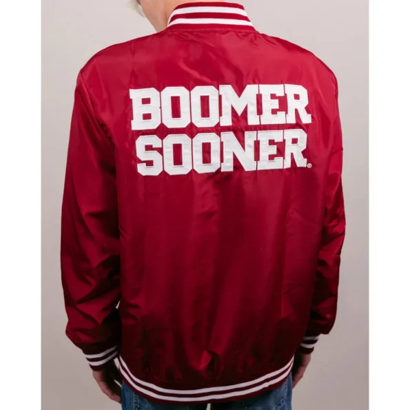 Model wearing Oklahoma Boomer Sooners Varsity Jacket back view.