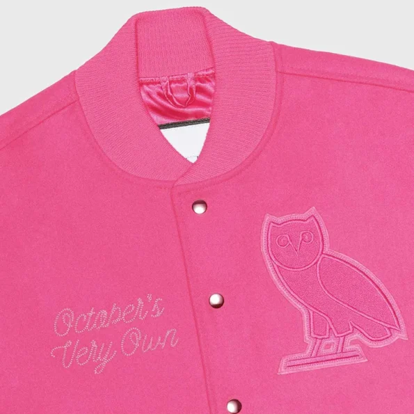 Close-up of Valentine OVO Pink Varsity Jacket detail