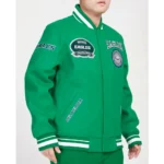 Model front view wearing Philadelphia Eagles Crest Varsity Jacket.