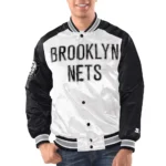 Model wearing Brooklyn Nets Varsity Jacket front stylish